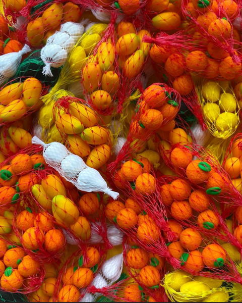 Shop Velanidi Orange Mesh Bag Earrings
